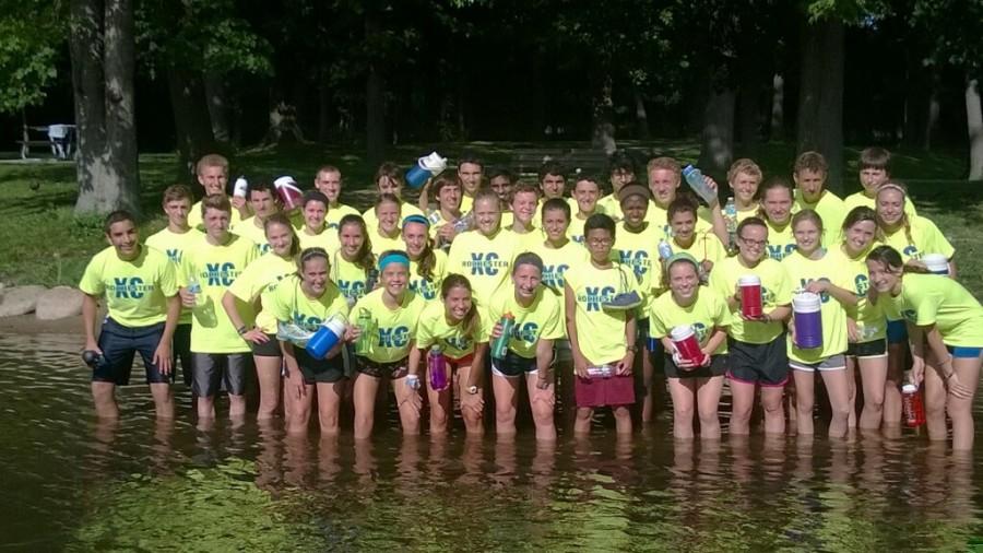 The XC team cools off in the Clinton river after a hard workout.