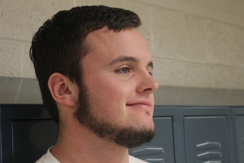 Senior Chris Russell, a regular at not shaving, showing his signature beard.