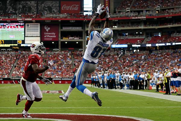 Calvin Johnson hauls in a  touchdown pass against the Arizona Cardinals.  Photo Courtesy of ESPN.