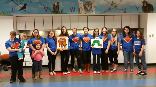 ASL club students of the 2014-2015 school year served as interpreters at the Rochester Hills Public Librarys story time for children. 