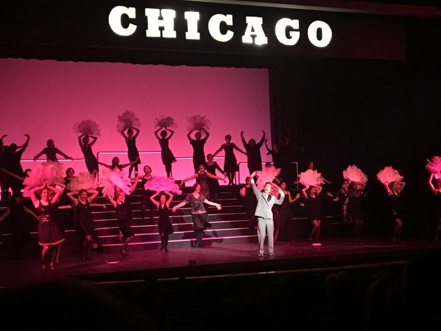 Students on stage performing Chicago
