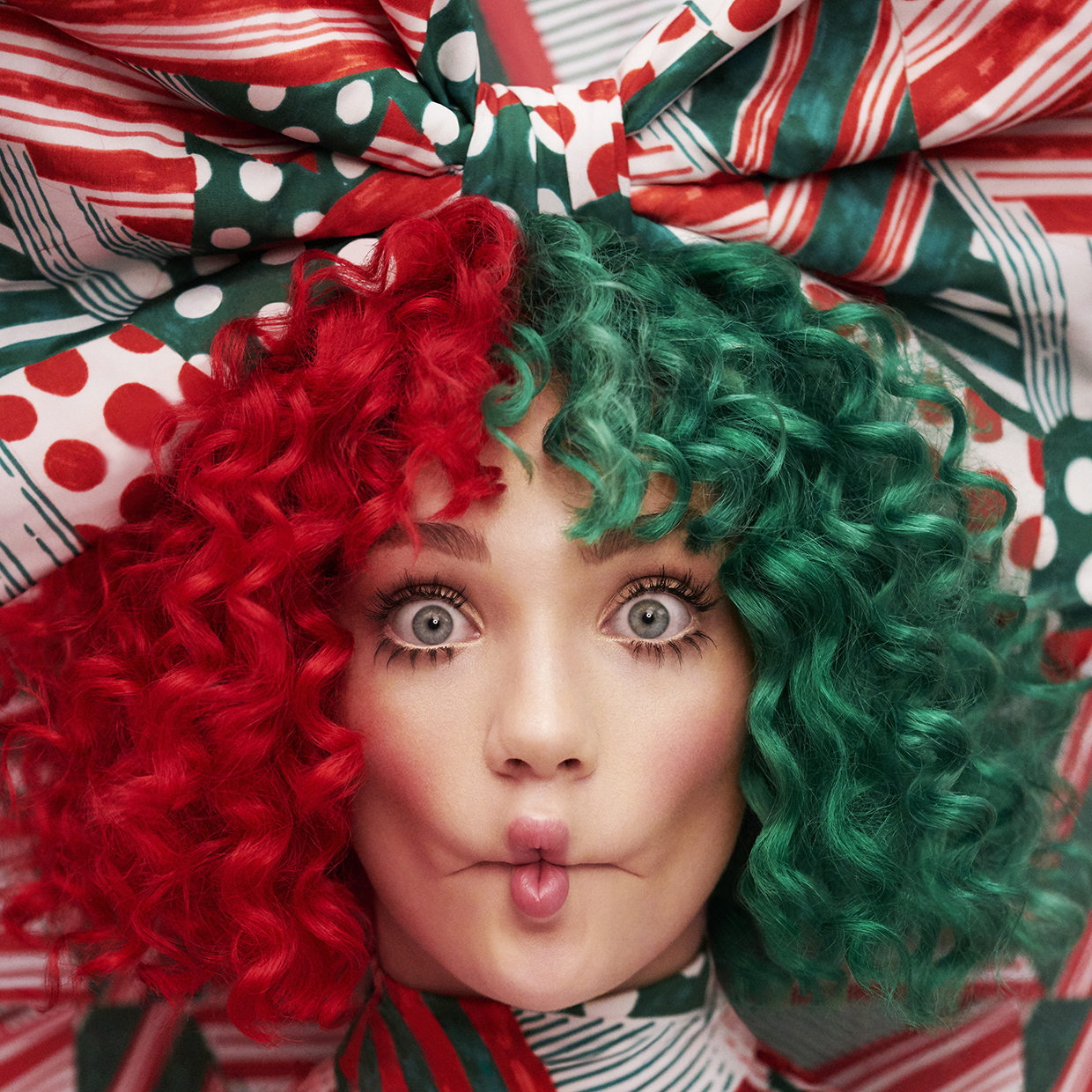 Sia dresses festively for the cover of her newest album,
