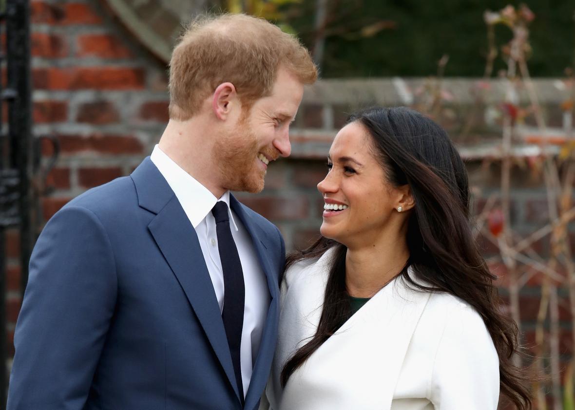 Prince Harry smiles with his fiance, American actress Meghan Markle. Photo courtesy of Creative Commons.