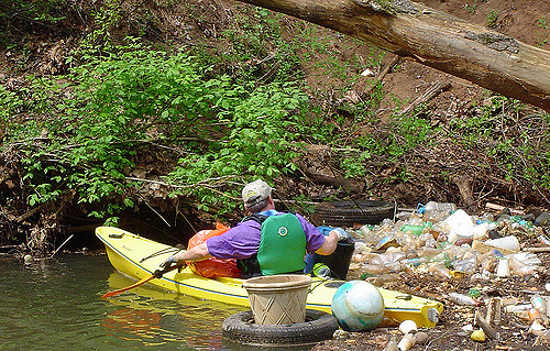 A stream being cleaned up in light of Earth Day. Photo courtesy of Creative Commons.